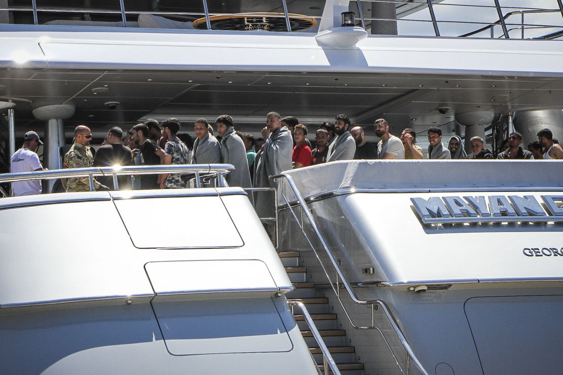 Survivors arrive in Kalamata on board the Mayan Queen superyacht.