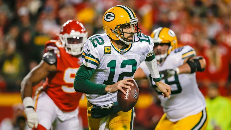 KANSAS CITY, MO - OCTOBER 27: Aaron Rodgers #12 of the Green Bay Packers scrambles away from defensive pressure by the Kansas City Chiefs in the first quarter at Arrowhead Stadium on October 27, 2019 in Kansas City, Missouri. (Photo by David Eulitt/Getty Images)