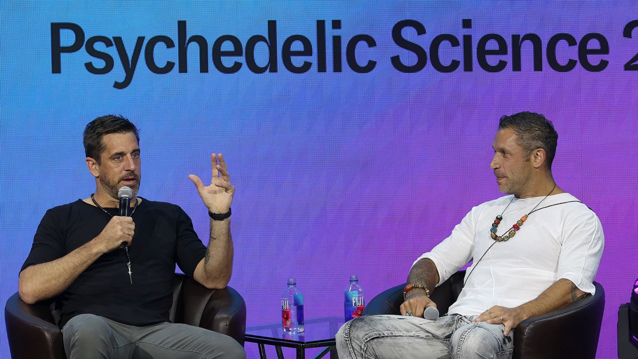 DENVER, COLORADO - JUNE 21: NFL Quarterback Aaron Rodgers participates in a talk with author Aubrey Marcus as part of Psychedelic Science 2023 in the Bellcor Theatre of the Colorado Convention Center on June 21, 2023 in Denver, Colorado. (Photo by Matthew Stockman/Getty Images)