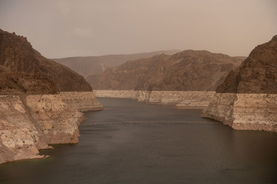 Bathtub rings, showing how far the water level has dropped, are seen along the banks of Lake Mead near the Hoover Dam in April 2023.