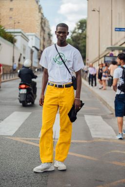 Model Ismael Savane pictured in an Air Afrique T-shirt during Paris Fashion Week Mens Spring-Summer 2023 on June 23, 2022 in Paris.