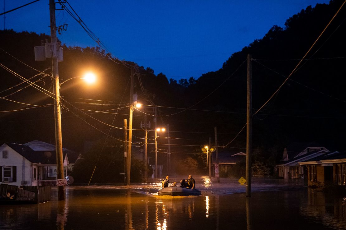 Members of the Jackson Fire Department prepare to conduct search and rescue operations downtown on July 28, 2022, in Jackson, Kentucky, after deadly flooding.