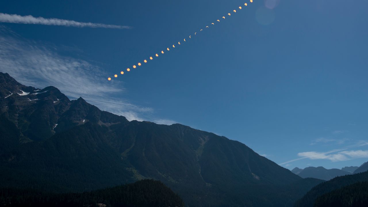This composite image shows the progression of a partial solar eclipse over Ross Lake, in Northern Cascades National Park, Washington on Monday, Aug. 21, 2017. A total solar eclipse swept across a narrow portion of the contiguous United States from Lincoln Beach, Oregon to Charleston, South Carolina. A partial solar eclipse was visible across the entire North American continent along with parts of South America, Africa, and Europe.