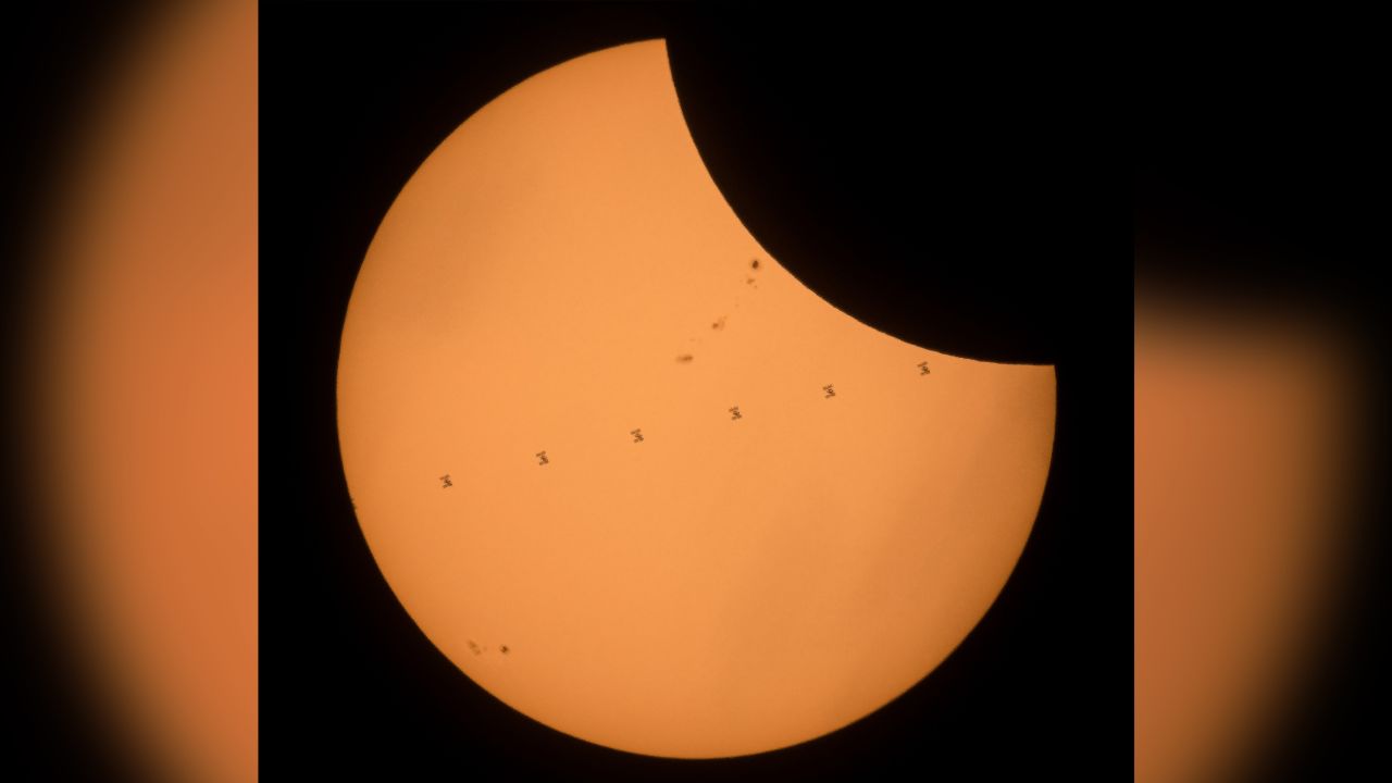 This composite image, made from seven frames, shows the International Space Station, with a crew of six onboard, as it transits the Sun at roughly five miles per second during a partial solar eclipse, Monday, Aug. 21, 2017 near Banner, Wyoming. Onboard as part of Expedition 52 are: NASA astronauts Peggy Whitson, Jack Fischer, and Randy Bresnik; Russian cosmonauts Fyodor Yurchikhin and Sergey Ryazanskiy; and ESA (European Space Agency) astronaut Paolo Nespoli.