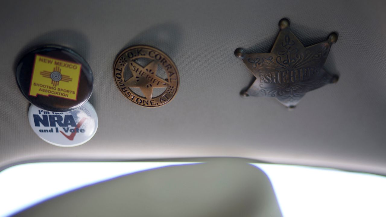 NRA and sheriff buttons are affixed to the roof of then-Sheriff Mace's truck in 2019.