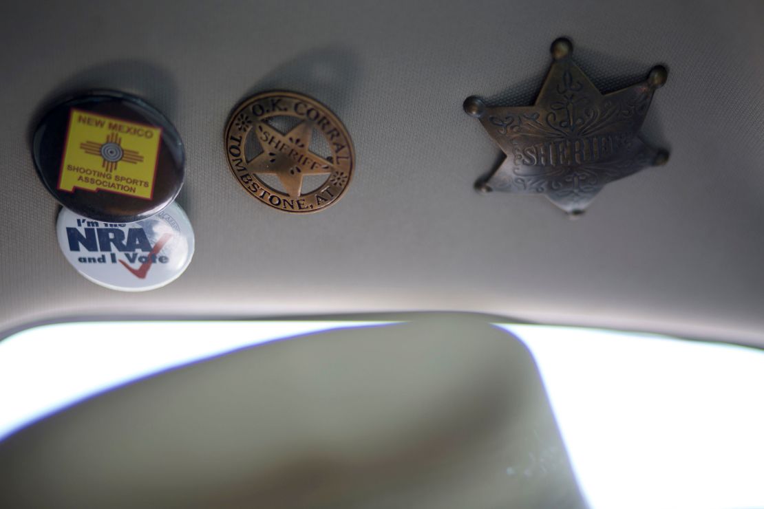 NRA and sheriff buttons are affixed to the roof of then-Sheriff Mace's truck in 2019.