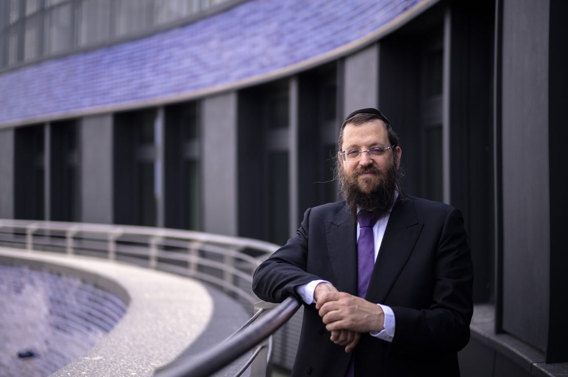 Rabbi Yehuda Teichtal poses on the balcony of the PJC.