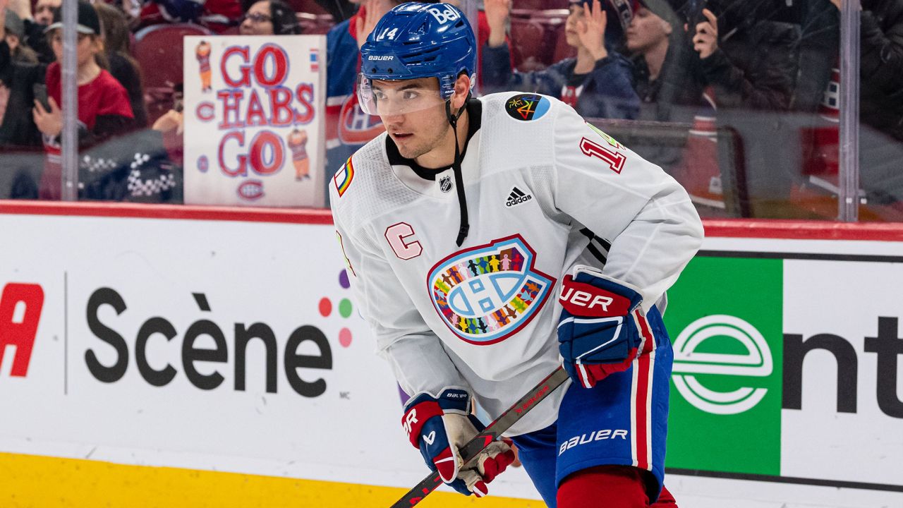 Nick Suzuki of the Montreal Canadiens wearing the Pride Night jersey during warm-ups before a game with the Washington Capitals at the Bell Centre on April 6, 2023 in Montreal.
