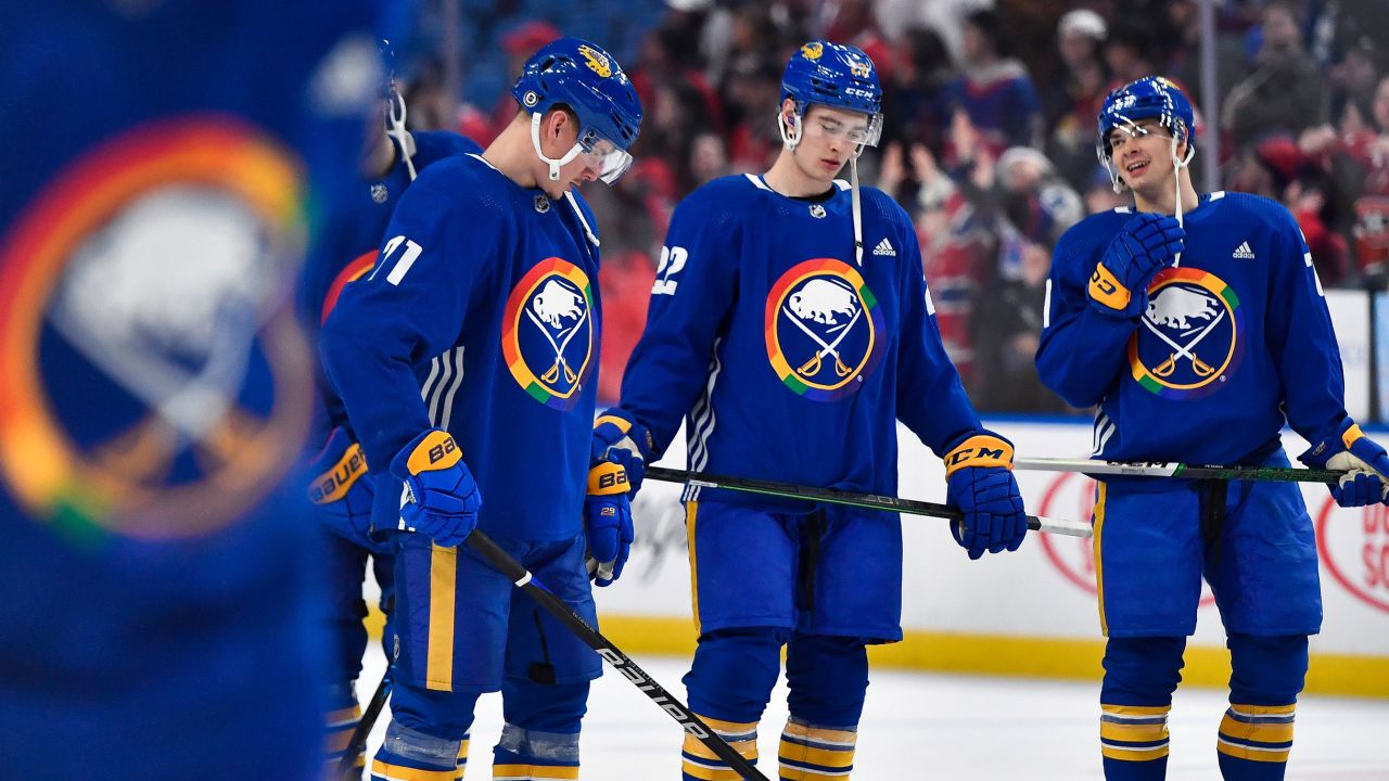 Buffalo Sabres left wing Victor Olofsson, left, right wing Jack Quinn and right wing JJ Peterka wear special warmup jerseys on Pride Night before an NHL game against the Montreal Canadiens in Buffalo, New York on March 27, 2023. 