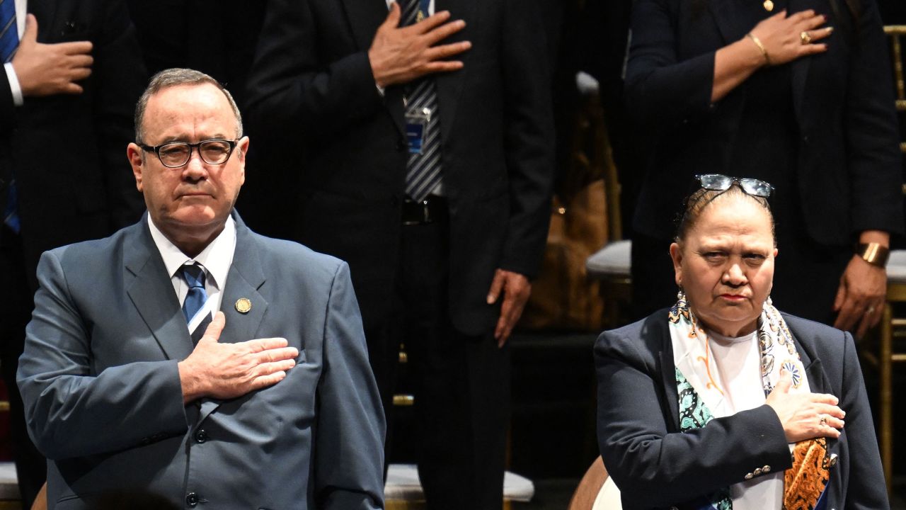 Guatemala's President Alejandro Giammattei (L) and Guatemala's Attorney General Maria Consuelo Porras be  the presumption    of the yearly  study  of the Public Ministry successful  Guatemala City connected  May 17, 2023. 