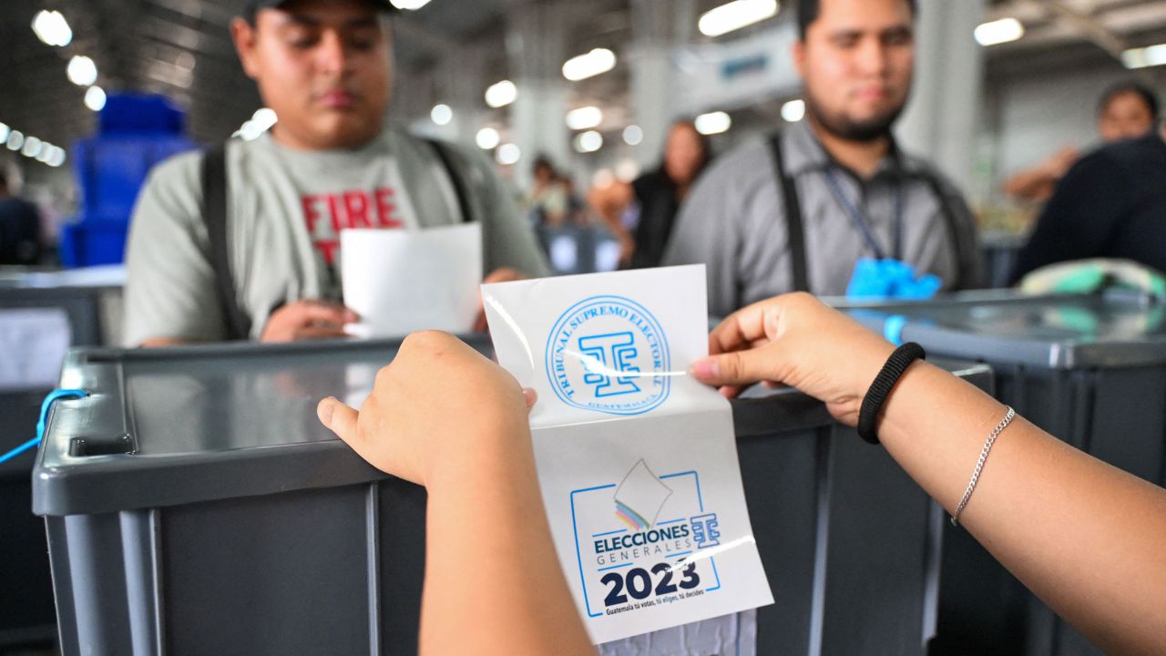 Employees of the Supreme Electoral Tribunal (TSE) arrange ahead of the general elections in Guatemala City on June 20, 2023.