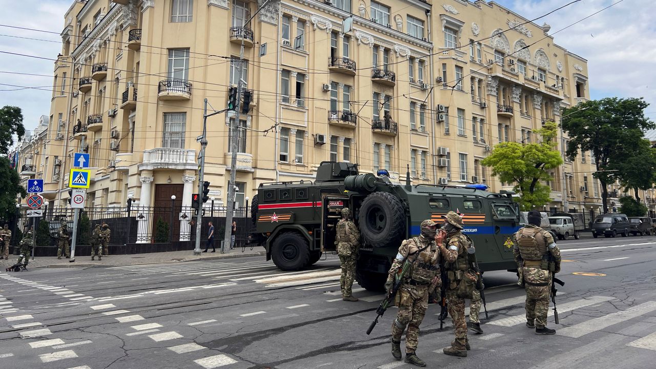 Wagner fighters stand guard near the headquarters of the Southern Military District in the city of Rostov-on-Don, Russia, on June 24.
