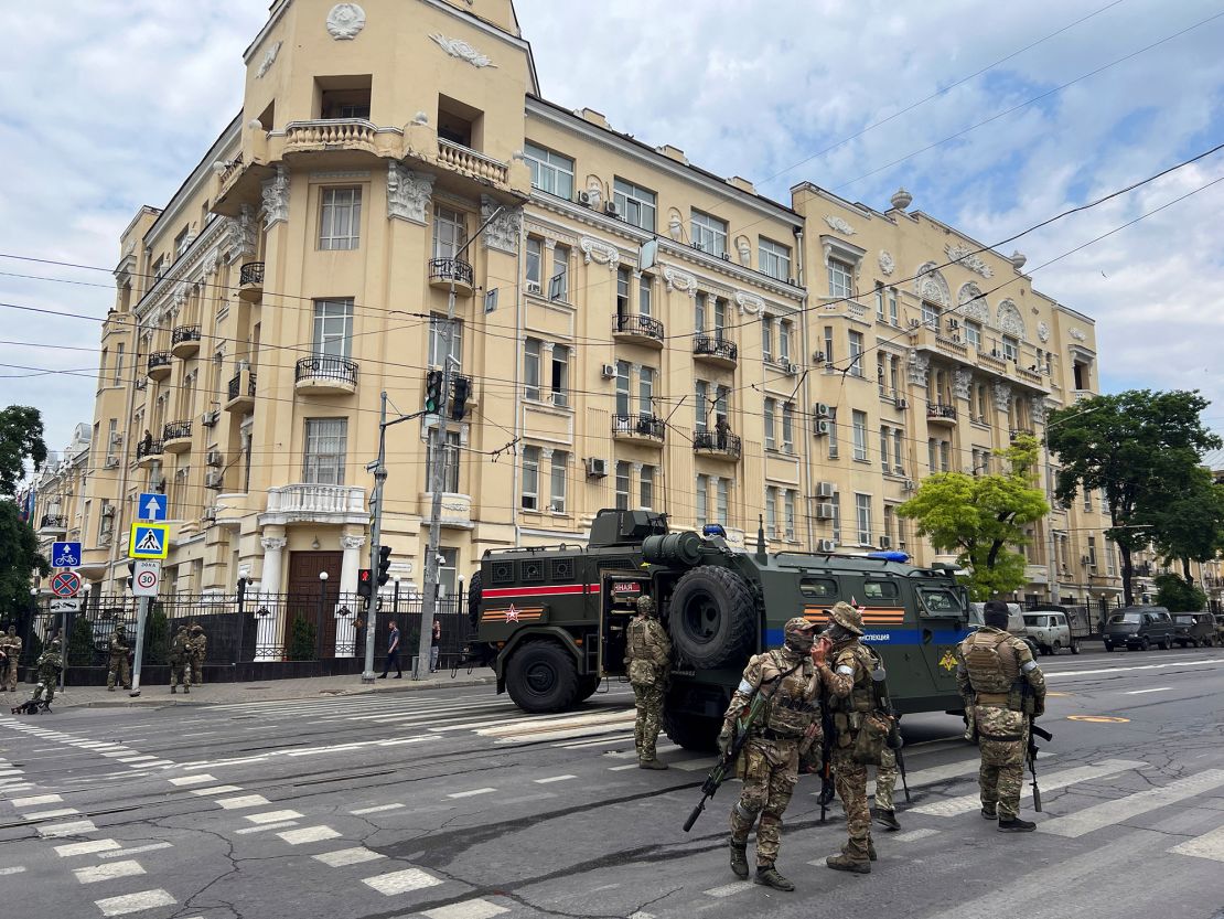 Wagner fighters stand guard near the headquarters of the Southern Military District in the city of Rostov-on-Don, Russia, on June 24.