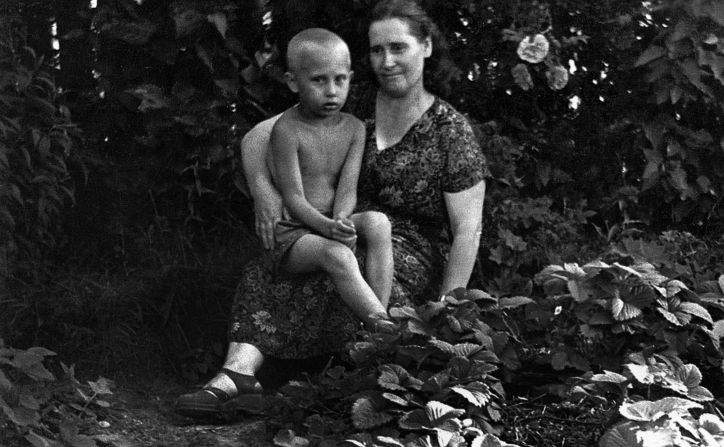 A 6-year-old Putin poses for a picture with his mother, Maria Putina, in 1958. He was born on October 7, 1952, in St. Petersburg, then known as Leningrad.