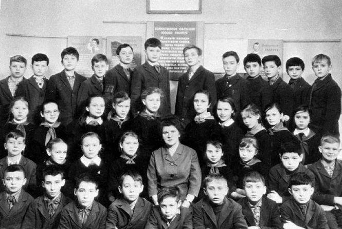 At age 13, Putin and other students pose for a class photo. He is seen in the first row, third from right.
