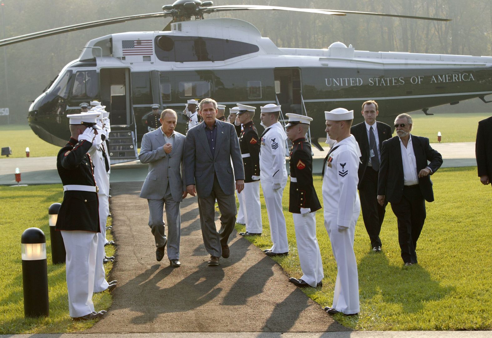 President Bush welcomes Putin upon his arrival at Camp David in 2003.