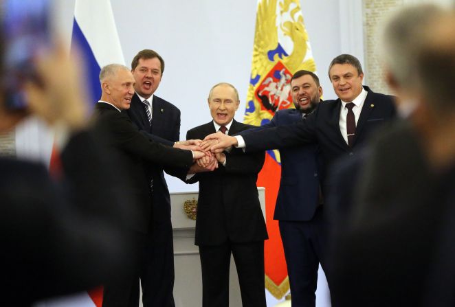 Putin meets with the Moscow-appointed heads of four Ukrainian regions, partially occupied by Russia, at the Grand Kremlin Palace in September 2022. In defiance of international law, Putin announced Russia would annex four Ukrainian regions as Russian territory: Luhansk and Donetsk — home to two Russian-backed breakaway republics where fighting has been ongoing since 2014 — as well as Kherson and Zaporizhzhia, two areas in southern Ukraine that have been occupied by Russian forces since shortly after the invasion began.