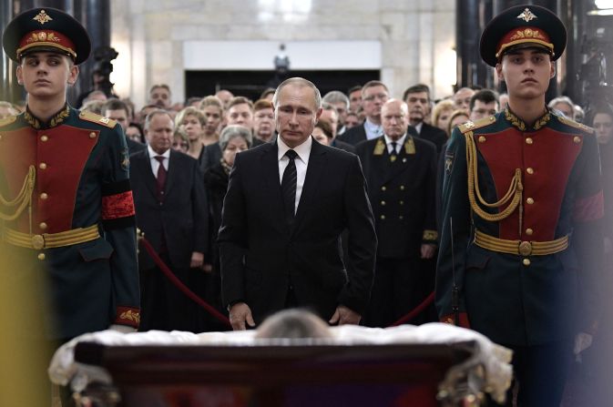 Putin pays his respects to slain Russian Ambassador to Turkey Andrei Karlov during the funeral ceremony at the Russian Foreign Ministry in Moscow in December 2016. Karlov was assassinated in Turkey by an off-duty policeman.
