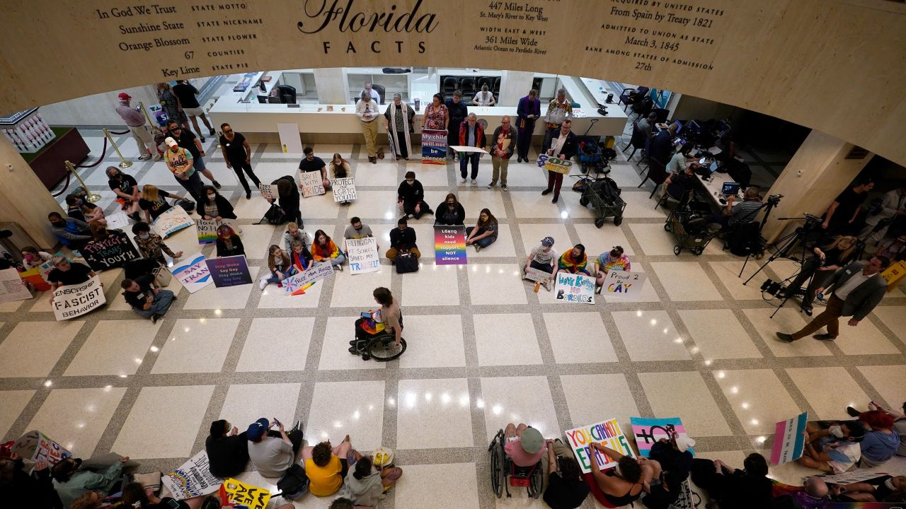 LGBTQ advocates protest inside the Florida State Capitol in Tallahassee on March 7, 2022. 