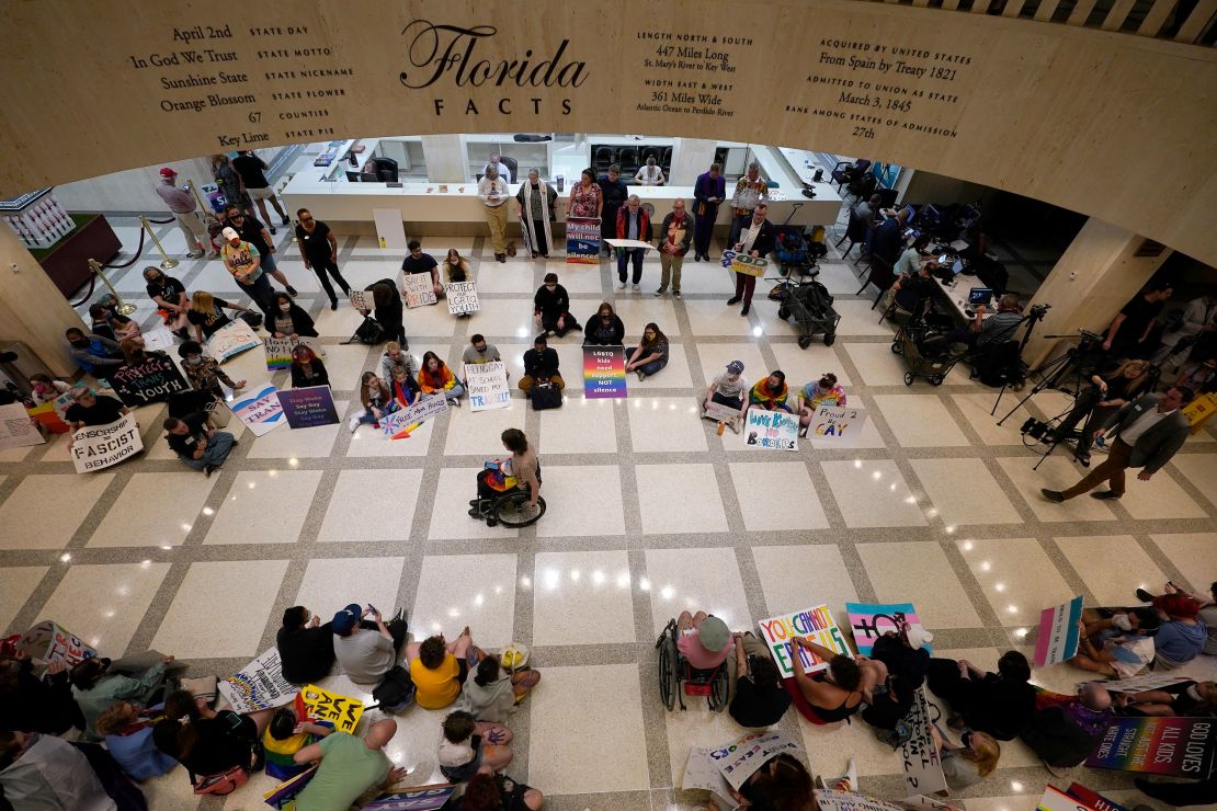 LGBTQ advocates protest inside the Florida State Capitol in Tallahassee on March 7, 2022. 