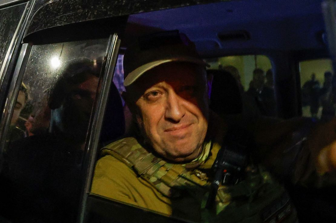 Wagner mercenary chief Yevgeny Prigozhin leaves the headquarters of the Southern Military District amid the group's pullout from the city of Rostov-on-Don.