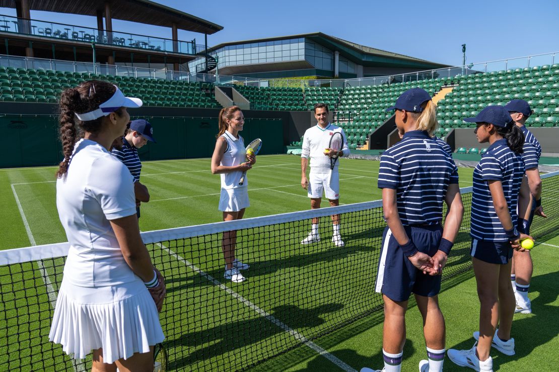 In this handout images released by Kensington Palace on June 24, 2023, Catherine, Princess of Wales and Wimbledon Champion Roger Federer playing tennis on No.3 Court at The All England Lawn Tennis Club, Wimbledon, on June 8, 2023 in London, England.
