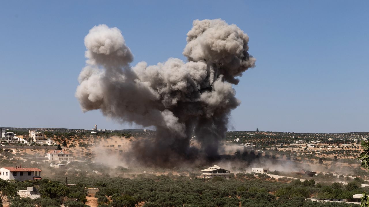 Smoke rises as a result of an air strike by Russian warplanes hit close to a fruit and vegetable market.