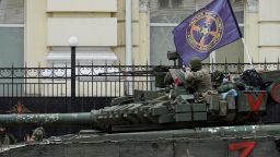 Members of Wagner group sit atop of a tank in a street in the city of Rostov-on-Don, on June 24, 2023. President Vladimir Putin on June 24, 2023 said an armed mutiny by Wagner mercenaries was a "stab in the back" and that the group's chief Yevgeny Prigozhin had betrayed Russia, as he vowed to punish the dissidents. Prigozhin said his fighters control key military sites in the southern city of Rostov-on-Don. (Photo by STRINGER / AFP) (Photo by STRINGER/AFP via Getty Images)