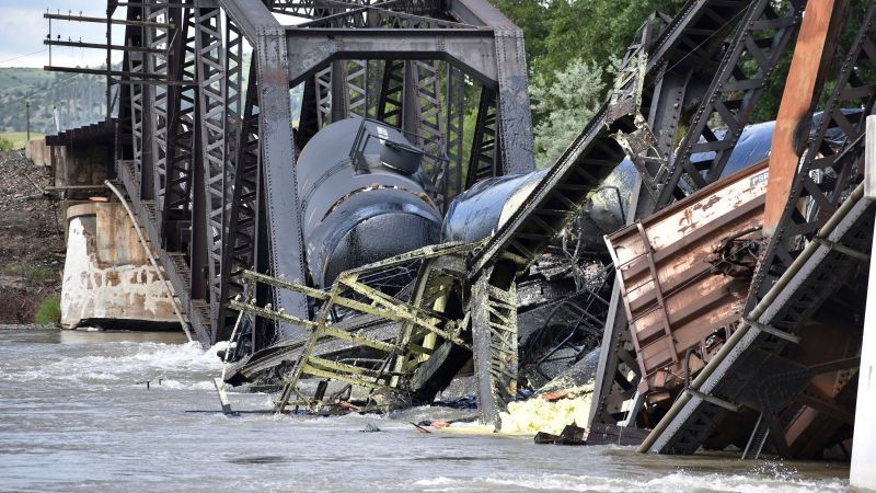 NextImg:Cleanup begins at the site of a Montana train derailment and Yellowstone River bridge collapse | CNN