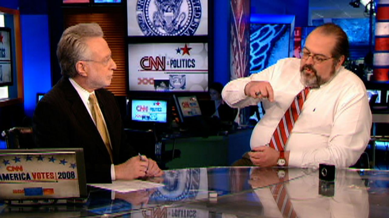 Bohrman, right, talks about the use of hologram cameras in the studio with CNN's Wolf Blitzer on November 5, 2008.