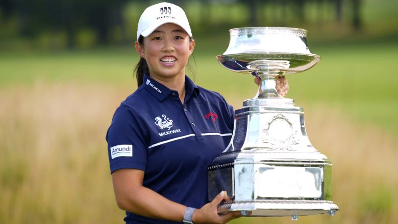 Ruoning Yin, of China, holds the trophy after winning the Women's PGA Championship golf tournament, Sunday, June 25, 2023, in Springfield, N.J. (AP Photo/Matt Rourke)