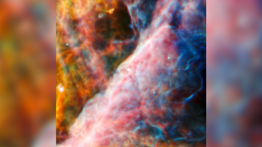 This image from Webb's MIRI (Mid-Infrared Instrument) shows a small region of the Orion Nebula. At the center of this view is a young star system with a protoplanetary disk named d203-506. An international team of astronomers detected a new carbon molecule known as methyl cation for the first time in d203-506.
