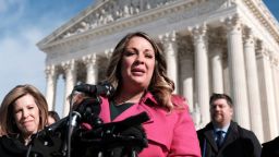 Lorie Smith, a web designer from Colorado, speaks to reporters outside after the Supreme Court heard arguments in her First Amendment battle pitting claims of religious freedom against laws prohibiting discrimination on the basis of sexual orientation in Washington, DC, on Dec. 5, 2022.