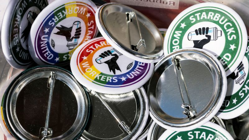 NextImg:Starbucks promises 'clearer' guidelines after Pride Month decor clash with union | CNN Business