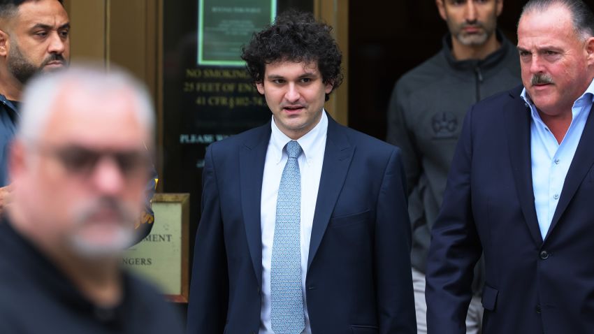 FTX Founder Sam Bankman-Fried leaves Manhattan Federal Court after a court appearance on June 15, 2023 in New York City. A court in the Bahamas temporarily barred the country's government from agreeing to let US prosecutors pursue part of their criminal case against Bankman-Fried this week due to them being added after his agreed extradition. The Justice Department in a filing informed Judge Lewis Kaplan that it will only try Bankman-Fried on the original eight counts mentioned in the original indictment that includes wire fraud, securities fraud, money laundering, and campaign finance fraud.  (Photo by Michael M. Santiago/Getty Images)