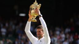 Tennis - Wimbledon - All England Lawn Tennis and Croquet Club, London, Britain - July 10, 2022
Serbia's Novak Djokovic celebrates with the trophy after winning the men's singles final against Australia's Nick Kyrgios