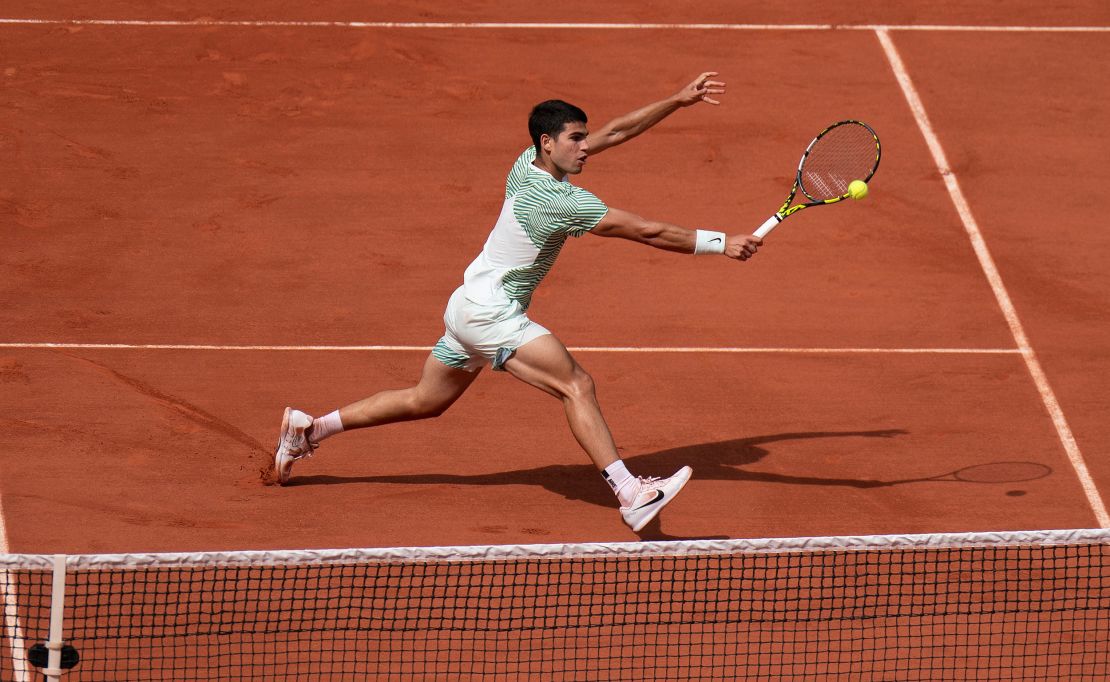 Jun 9 2023; Paris,France; Carlos Alcaraz (ESP) returns a shot during his semifinal match against Novak Djokovic (SRB) on day 13 at Stade Roland-Garros.