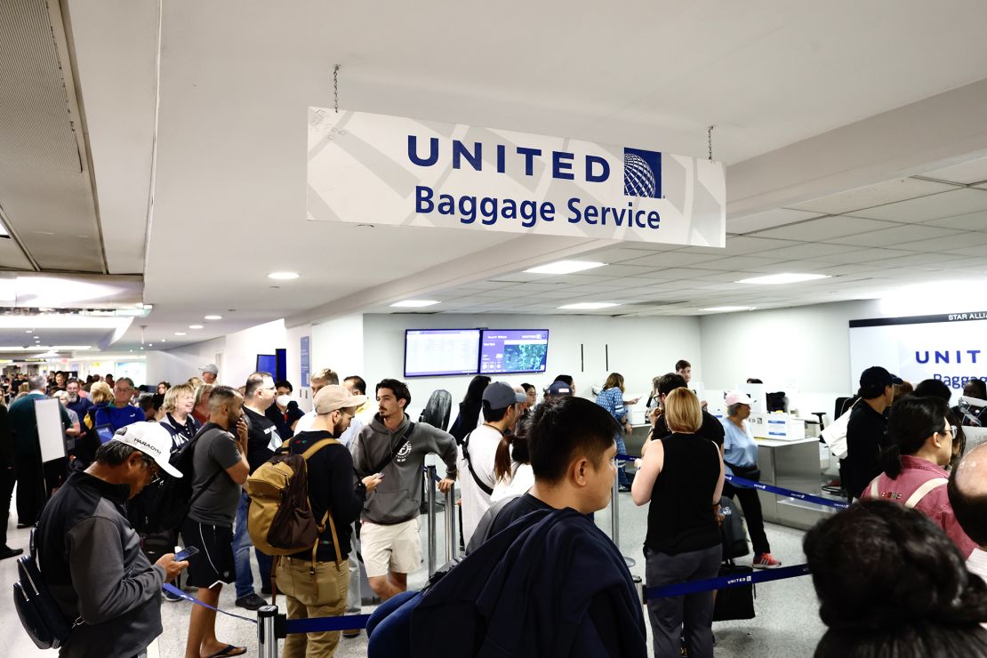 People wait for their flight reschedule inside of the Newark International Airport on June 27, 2023 in Newark, New Jersey. 