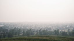 Haze obscures the skyline in Cedar Rapids, Iowa, on Tuesday, June 27, 2023. Smoke from wildfires in Canada caused low air quality and obscured visibility. (Nick Rohlman/The Gazette via AP)