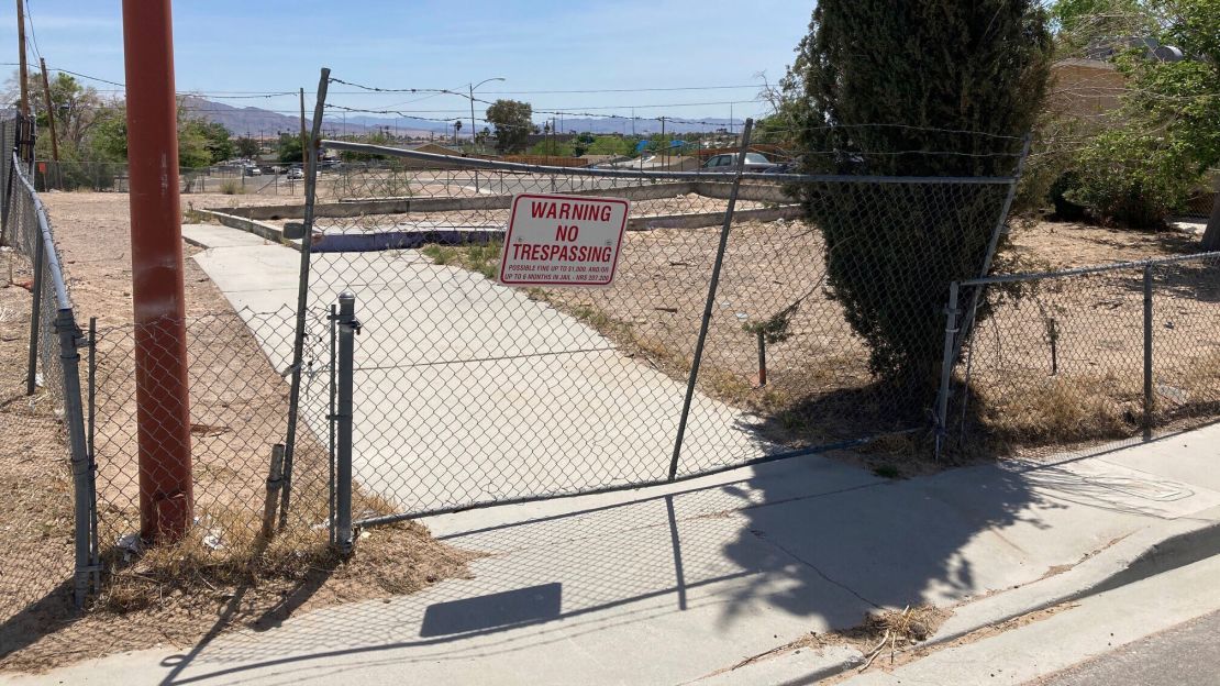 A fence lines an uneven foundation where a home once stood in the Windsor Park neighborhood of North Las Vegas.