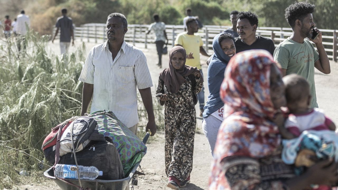 Refugees from Sudan cross into Ethiopia in Metema, on May 4, 2023. More than 15,000 people have fled Sudan via Metema since fighting broke out in Khartoum in mid-April, according to the UN's International Organization for Migration, with around a thousand arrivals registered per day on average. (Photo by Amanuel Sileshi / AFP) (Photo by AMANUEL SILESHI/AFP via Getty Images)