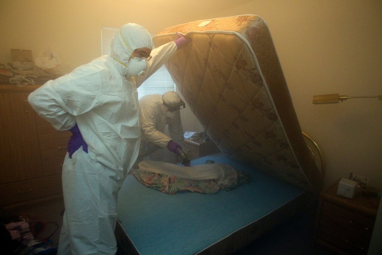 January 10, 2011 Christian Cadieux (R), owner of Bed Bugs Bite , and employee Jeff Lake fumigates a matress as part of their process to get rid of bedbugs. Toronto Star/Andrew Wallace (Photo by Andrew Francis Wallace/Toronto Star via Getty Images)