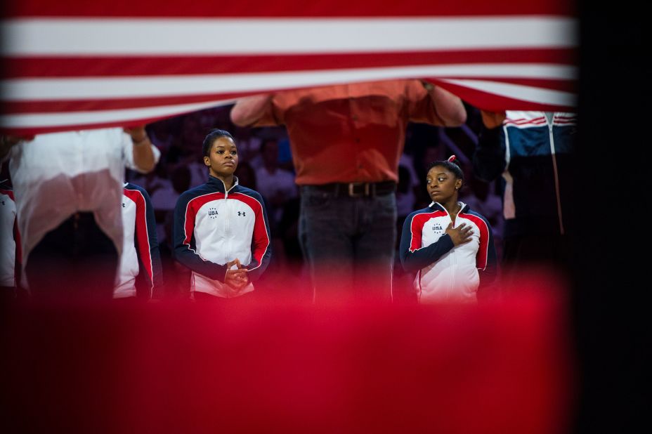 Biles, right, and fellow gymnast Gabby Douglas stand during the opening ceremony of the 2016 US Olympic Trials. Both made the team. Douglas was the Olympic all-around champion in 2012.