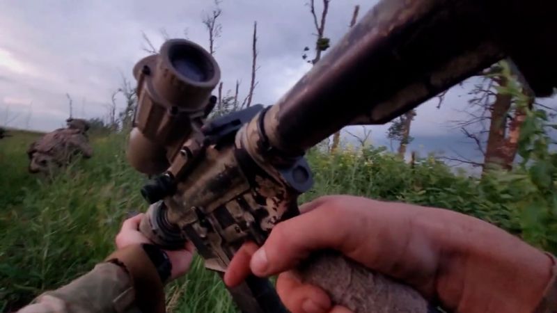 NextImg:Ex-US Marine in Ukraine shares video of storming of Russian positions | CNN