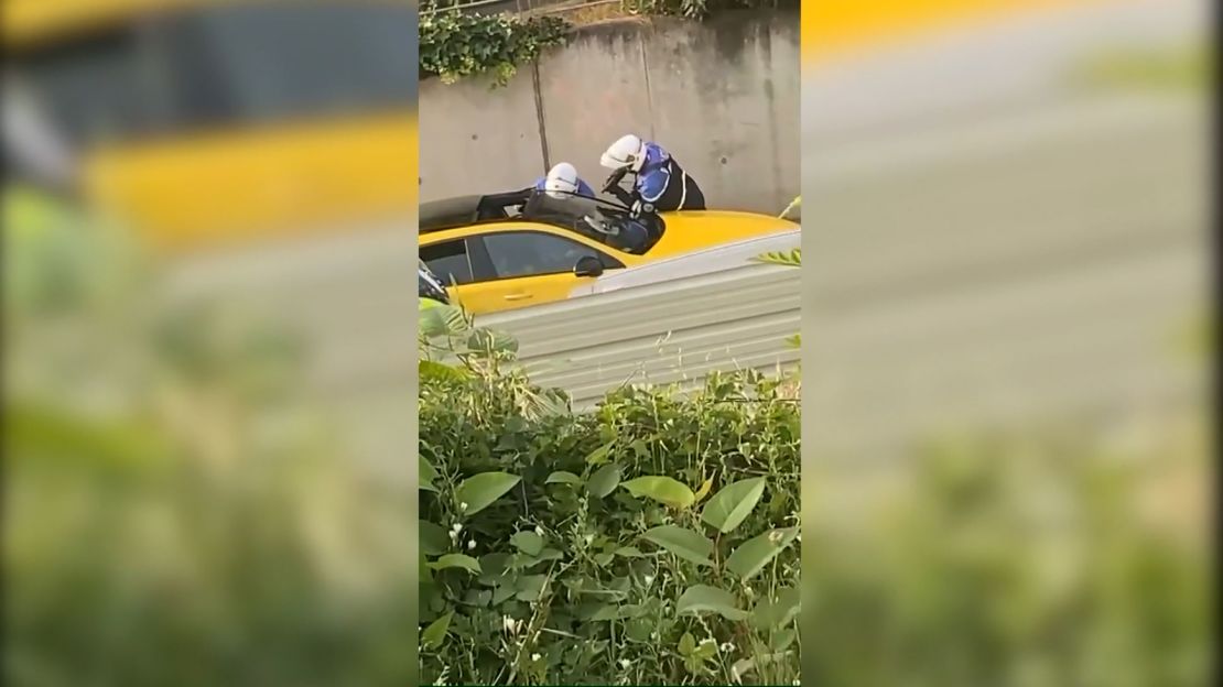 This screengrab from video posted on Twitter shows the moment when police interacted with a 17-year-old teen during a traffic stop in a Paris suburb.