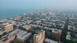 Haze obscures buildings along the Lake Michigan shoreline in Chicago Wednesday, June 28, 2023.