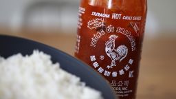 A bottle of Huy Fong Foods Sriracha sauce is displayed on June 10, 2022 in San Anselmo, California. Due to a shortage of the chili peppers used to make Sriracha hot sauce, the popular condiment is becoming hard to find on store shelves.