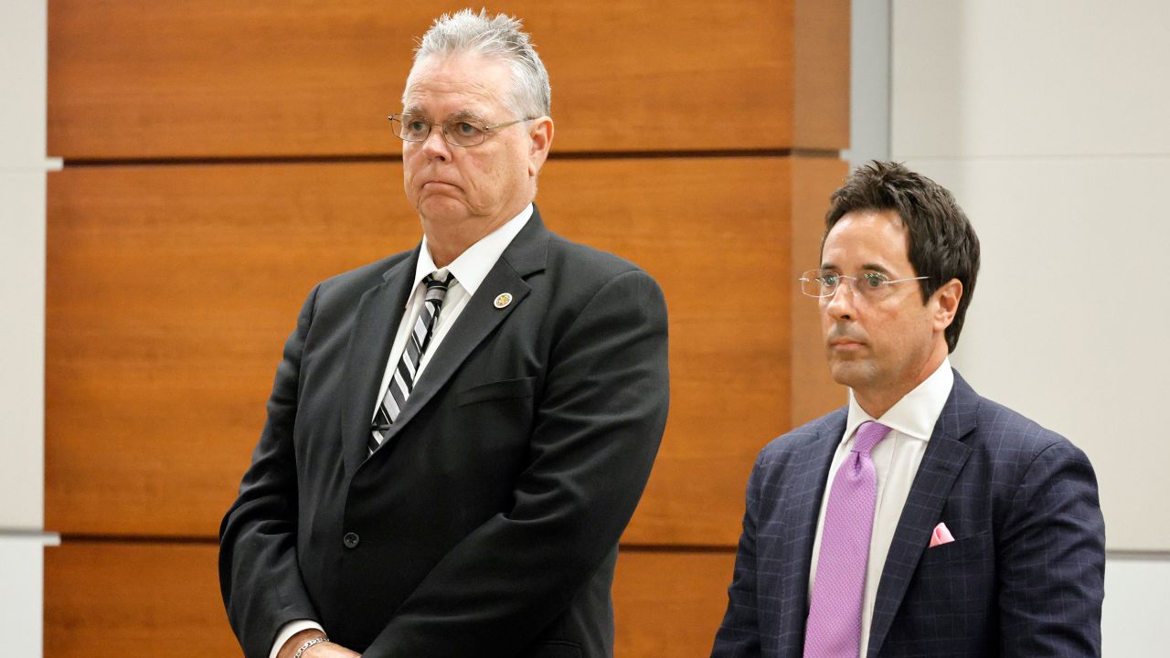 Scot Peterson, left, and defense attorney Mark Eiglarsh stand as the jury entered the courtroom to be dismissed on June 28, 2023.