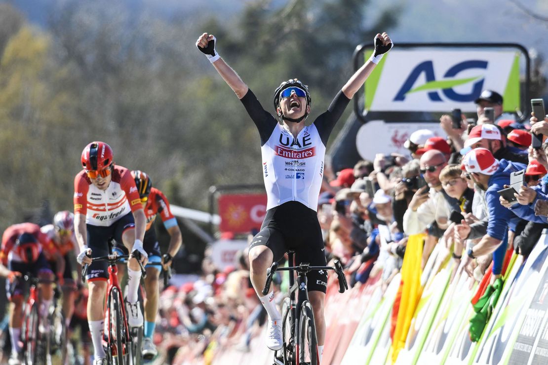 Slovenian Tadej Pogacar of UAE Team Emirates celebrates as he crosses the finish line to win the 86th edition of the men's race "La Fleche Wallonne", a one day cycling race (Waalse Pijl - Walloon Arrow), 194,2 km from Herve to Huy, in Belgium, on April 19, 2023 (Photo by GOYVAERTS / BELGA / AFP) / Belgium OUT (Photo by GOYVAERTS/BELGA/AFP via Getty Images)