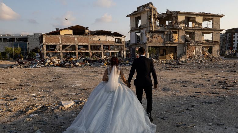 HATAY, TURKIYE- JUNE 27: Caner Can Özkanand Hamide Büşra Çağlar, who got engaged before the earthquake in Hatay, got married in Antakya Pazar Yeri container city where their families were staying on June 27, 2023 in Hatay Images)